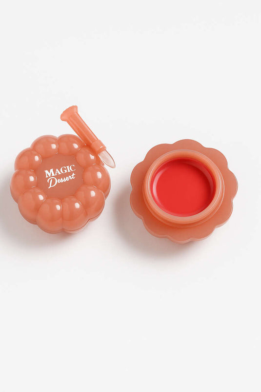 Perzikkleurige lipgloss met applicator