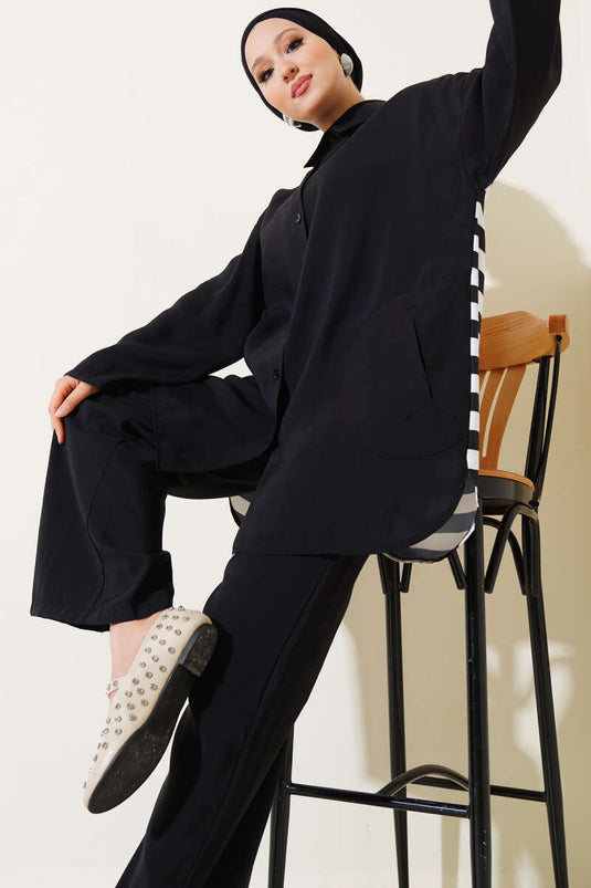 Completo due pezzi con dettaglio a righe sul retro, nero