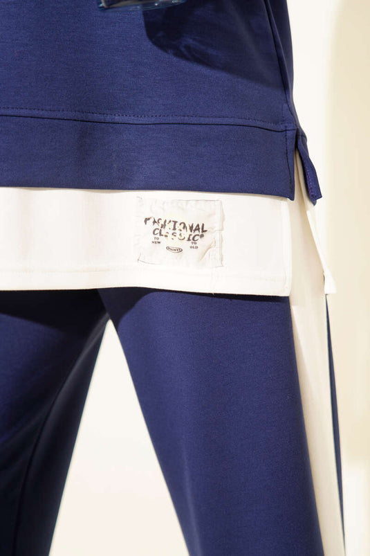 Ensemble double avec écusson détaillé et garniture en velours bleu marine