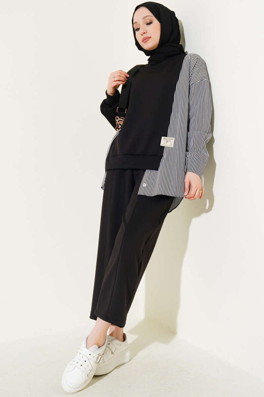 بدلة سوداء من قطعتين مزينة بشعار مخطط