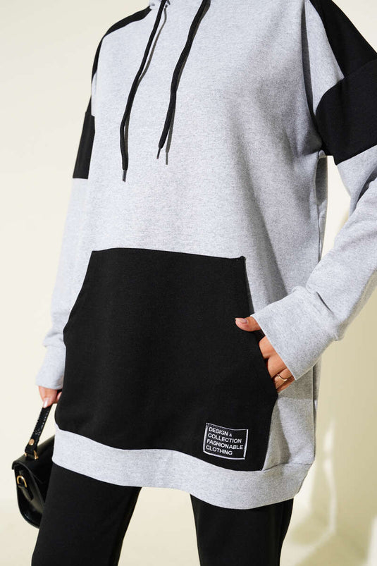 بدلة Emblem المكونة من قطعتين ذات غطاء رأس باللون الأسود