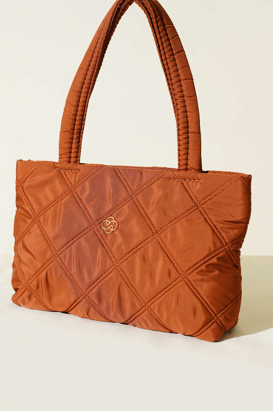 Dames handtas met kapitone en gesp, tabakskleurig