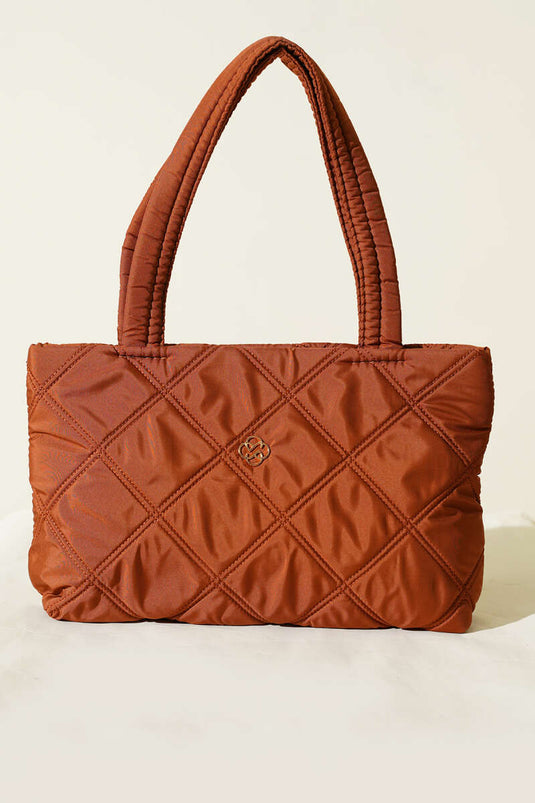 Dames handtas met kapitone en gesp, tabakskleurig