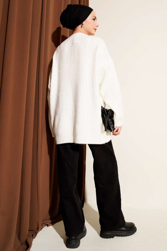 Asymmetrisch geprägte Strick-Tunika in Ecru