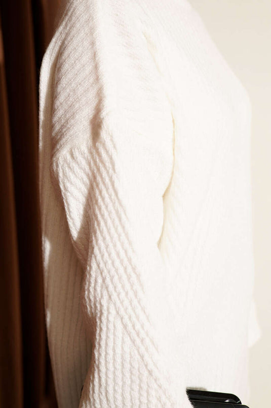 Asymmetrisch geprägte Strick-Tunika in Ecru