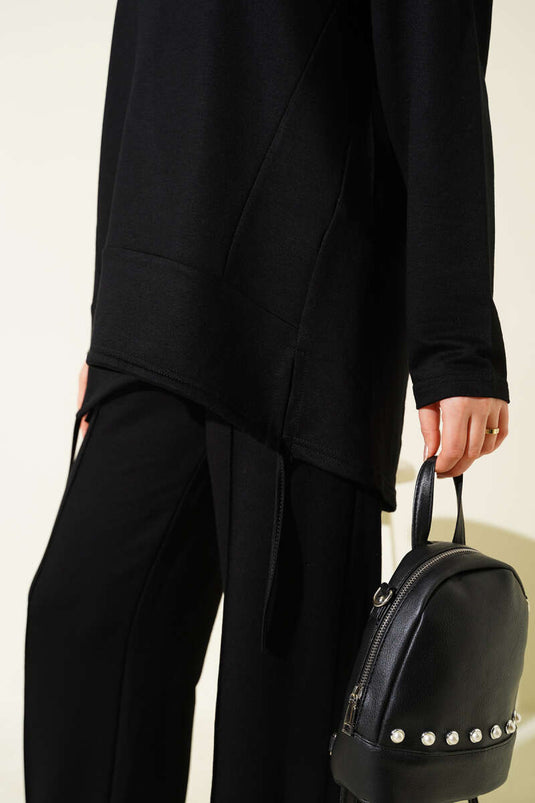 Ensemble deux pièces noir à col rond avec coupe asymétrique