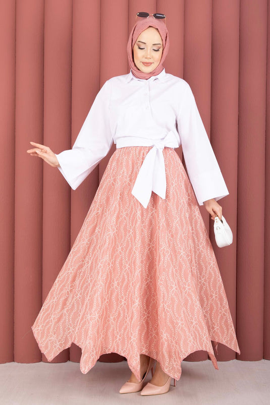 Jupe à découpe asymétrique avec motif en dentelle couleur rose fané