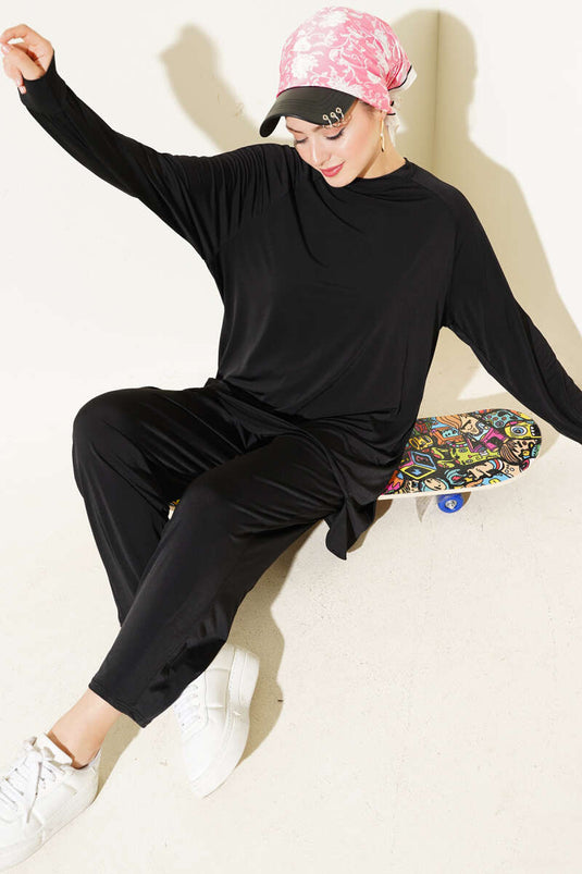 Asymmetrisch gesneden zandkleurige tuniek, tweedelig set, zwart