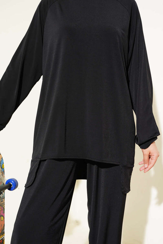 Asymmetrisch gesneden zandkleurige tuniek, tweedelig set, zwart