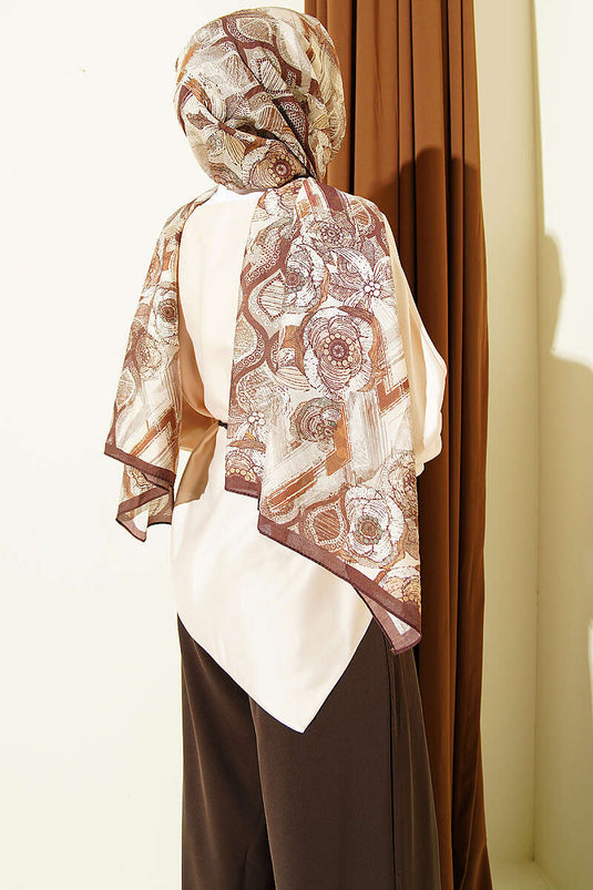 Tunica in satin beige con taglio asimmetrico