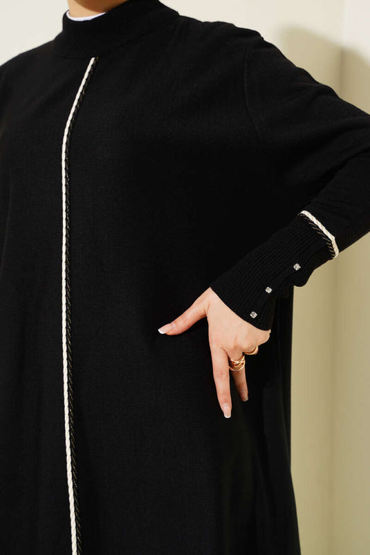 تونيك طويل محبوك بقصّة غير متماثلة باللون الأسود