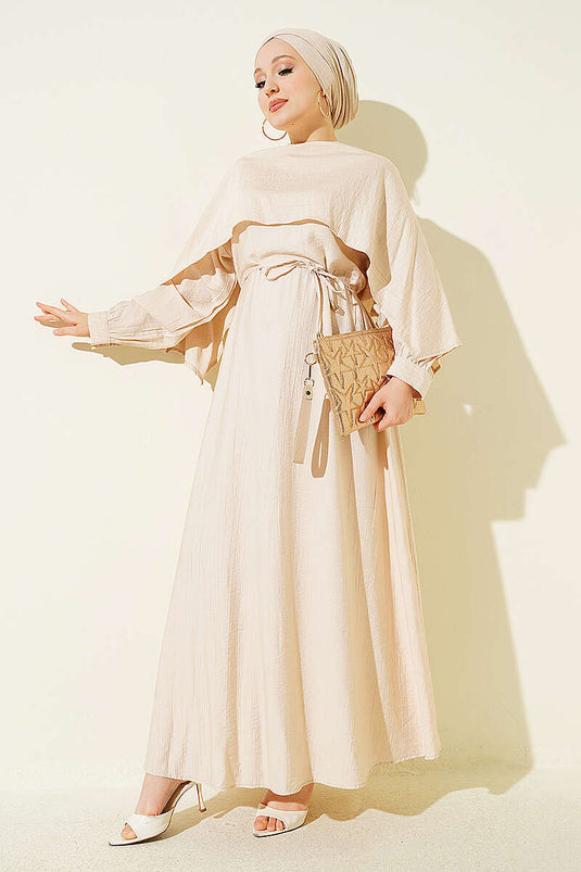 Vestido Beige Asimétrico Con Detalles En Los Hombros