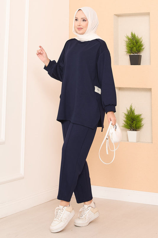 Maillot deux pièces Oysho bleu marine avec emblème à fente asymétrique