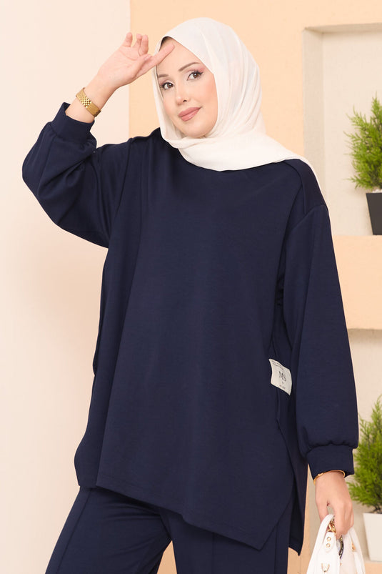 Maillot deux pièces Oysho bleu marine avec emblème à fente asymétrique