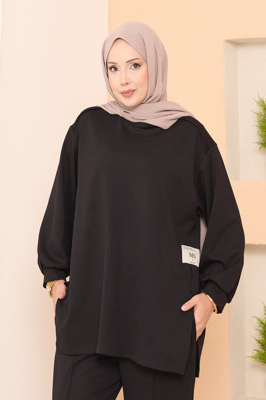 Maillot deux pièces Oysho noir avec emblème à fente asymétrique