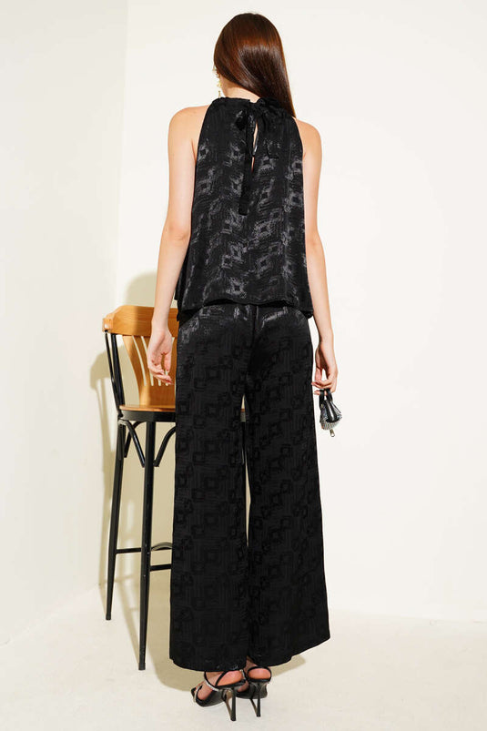 Ensemble deux pièces noir à bretelles en jacquard et bretelles