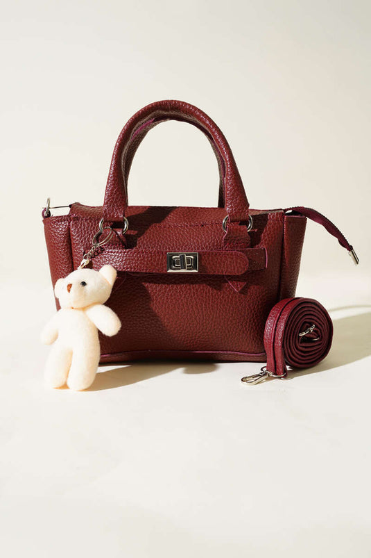 Sac à fermeture éclair avec accessoires ours en peluche, rouge bordeaux