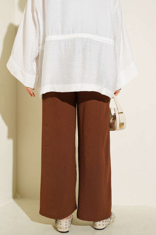 Pantaloni Ayrobin con elastico in vita color castagna