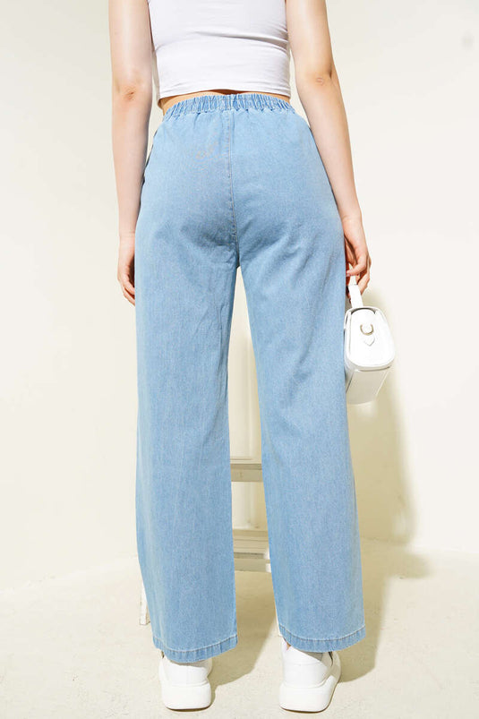 Pantalon en jean bleu avec ceinture élastique et détails à lacets