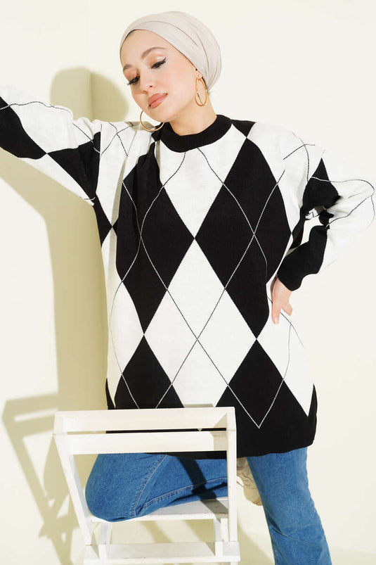 سترة سوداء أساسية محبوكة بنمط البقلاوة