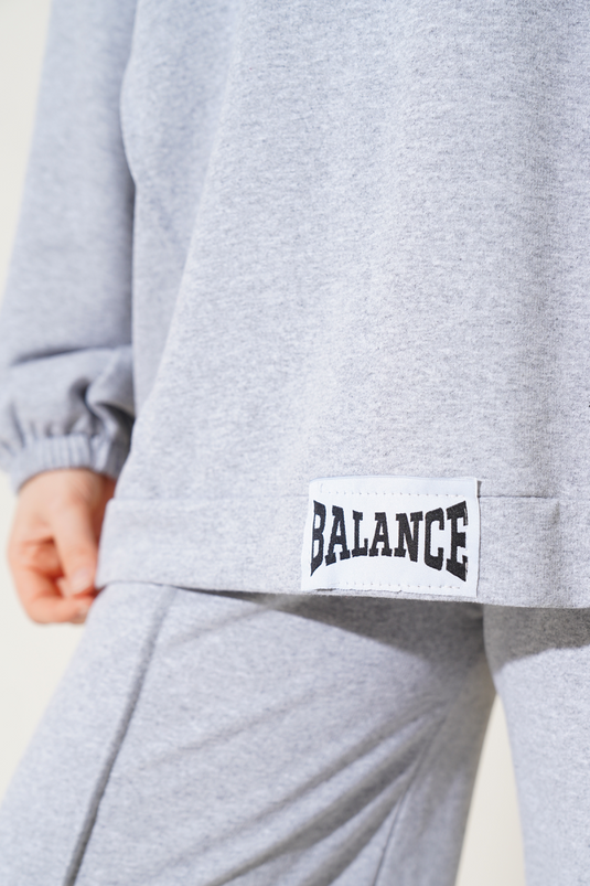 Balance Emblem – Lässiges zweiteiliges Set mit Kapuze in Melange-Grau