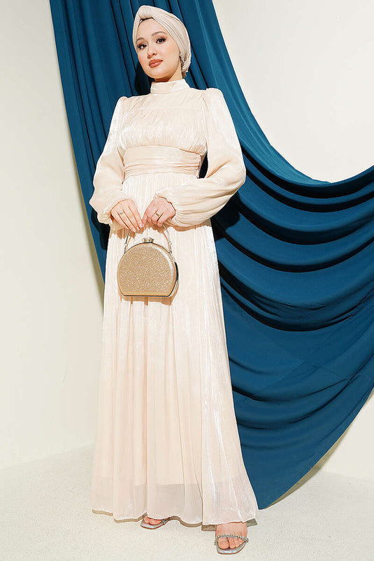 Robe de soirée drapée beige à manches ballon et taille cintrée