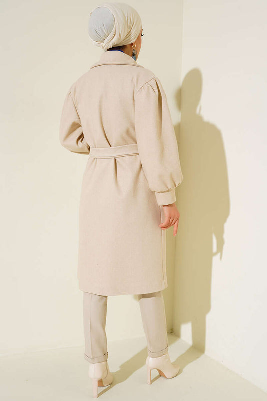 Manteau en cachemire beige à manchettes ballon