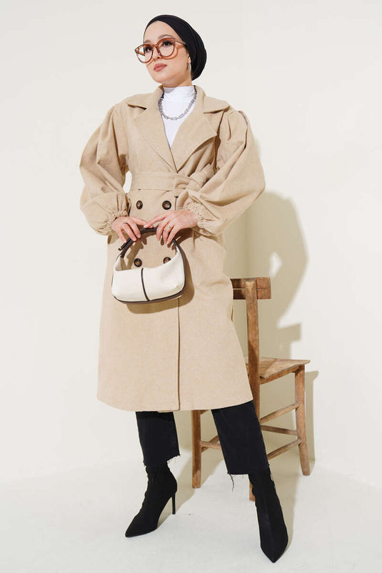 Manteau en cachemire beige à manches ballon et ceinture