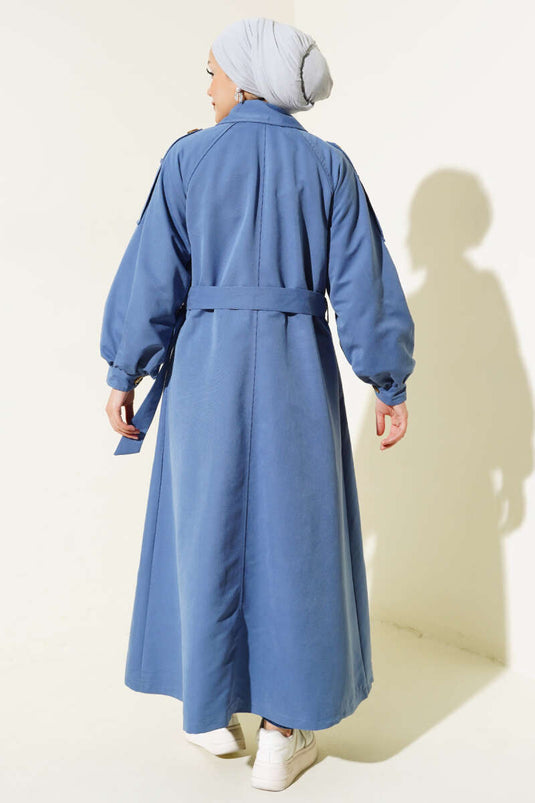 Lange trenchcoat met ballonmouwen en riem indigo