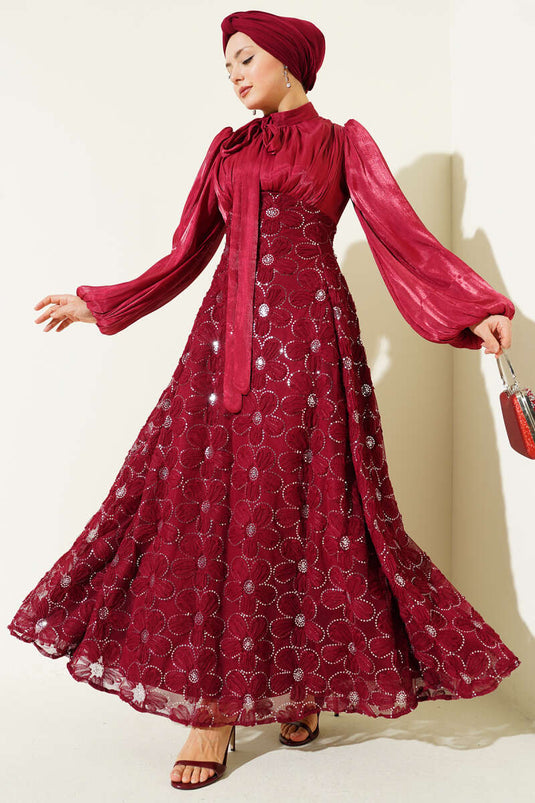 Abito da cerimonia bordeaux con maniche a palloncino e fiori ricamati