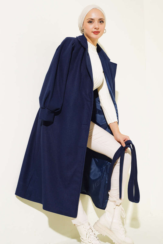 Manteau long en cachemire bleu marine à manches ballon