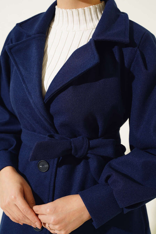 Manteau long en cachemire bleu marine à manches ballon