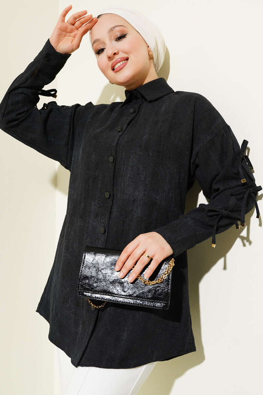 Chemise noire à manches et nœud à motif batik