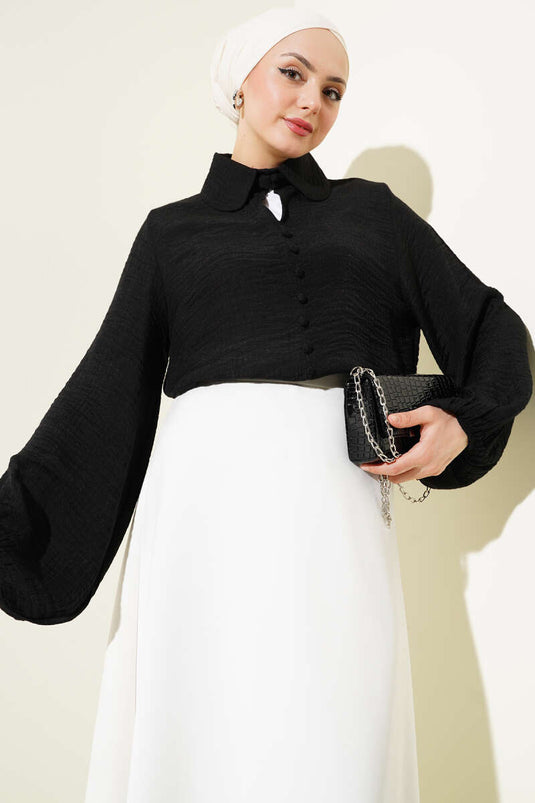 Schwarze Babybluse aus Seersucker mit Kragen und Knopfleiste