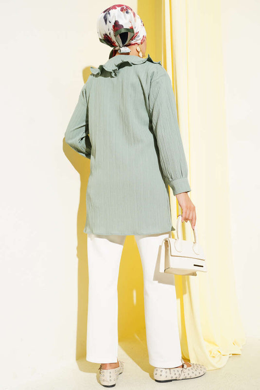 قميص بياقة رضيع مع فيونكة باللون الأخضر اللوزي