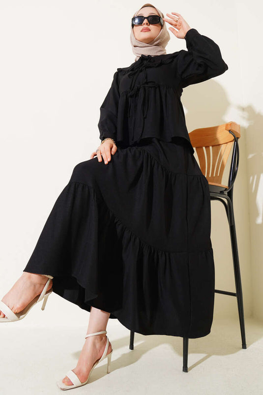 Ensemble deux pièces à jupe et col bébé, noir