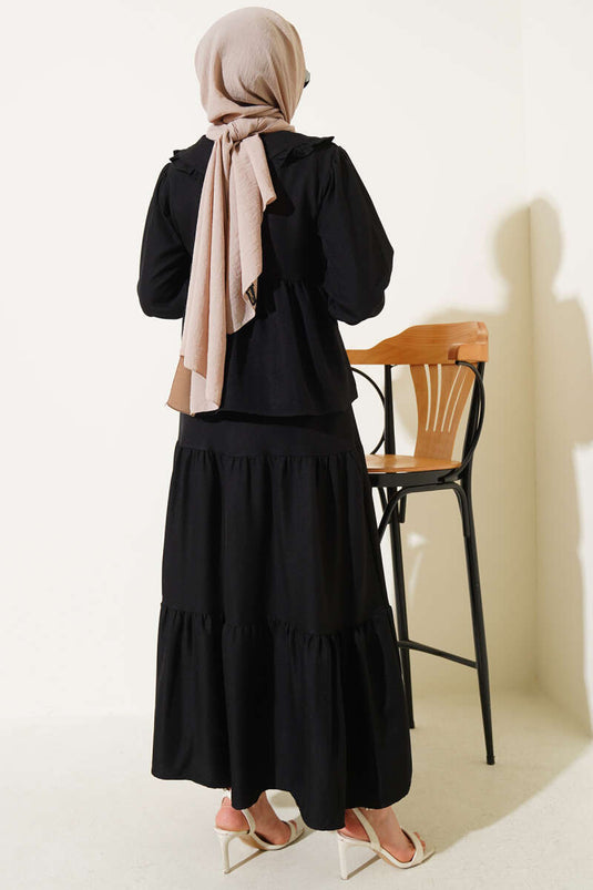 Ensemble deux pièces à jupe et col bébé, noir