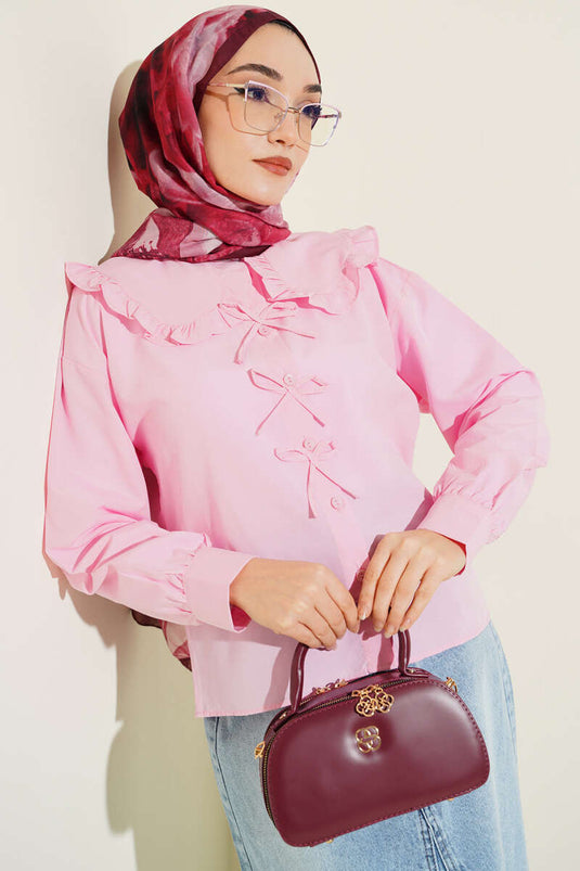Chemise rose avec col bébé et détail ruban