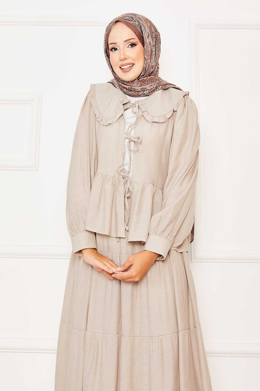 Ensemble jupe et col bébé beige à nouer sur le devant