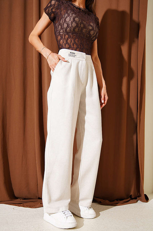 Pantalón Beige De Pierna Ancha Con Cinturilla Bordada