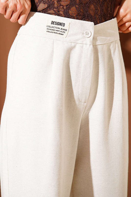 Pantalón Beige De Pierna Ancha Con Cinturilla Bordada