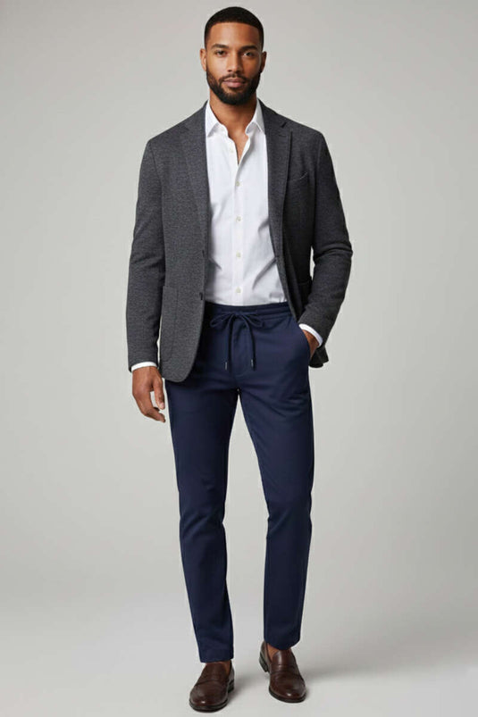 بنطال رجالي ضيق الساق بجيوب وتفاصيل رباط الحزام باللون الأزرق الداكن