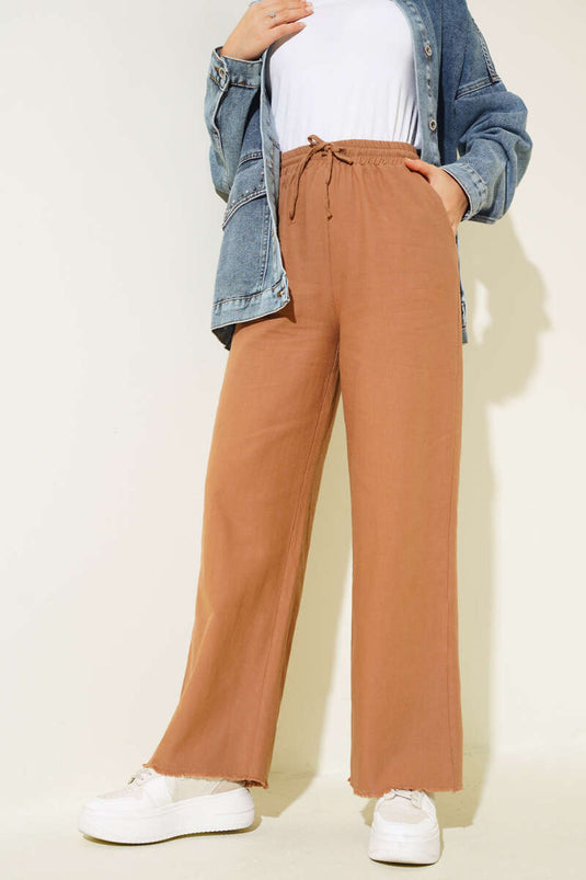 Pantaloni con nappe e lacci in vita Visone