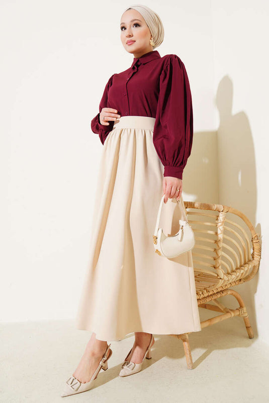 تنورة واسعة بجيوب وسحاب على الخصر باللون البيج