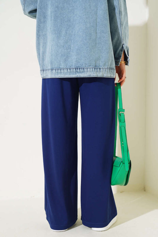 بنطلون فضفاض برباط على الخصر باللون الأزرق الداكن