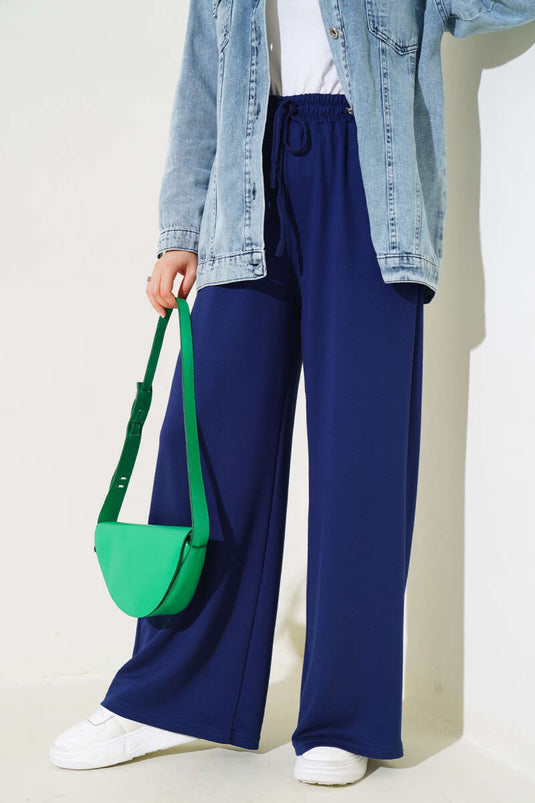 بنطلون فضفاض برباط على الخصر باللون الأزرق الداكن