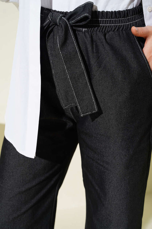 Pantaloni neri con fascia elastica e cintura elegante
