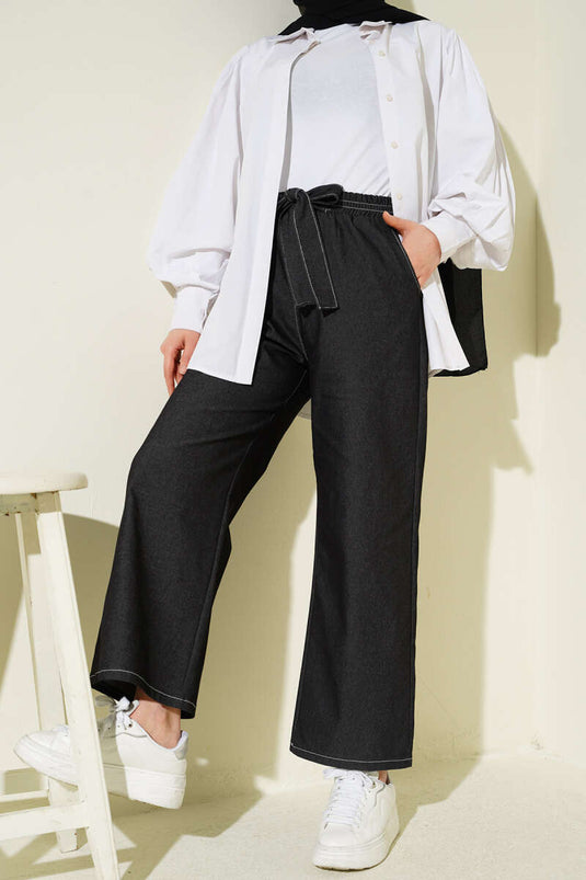 Pantaloni neri con fascia elastica e cintura elegante