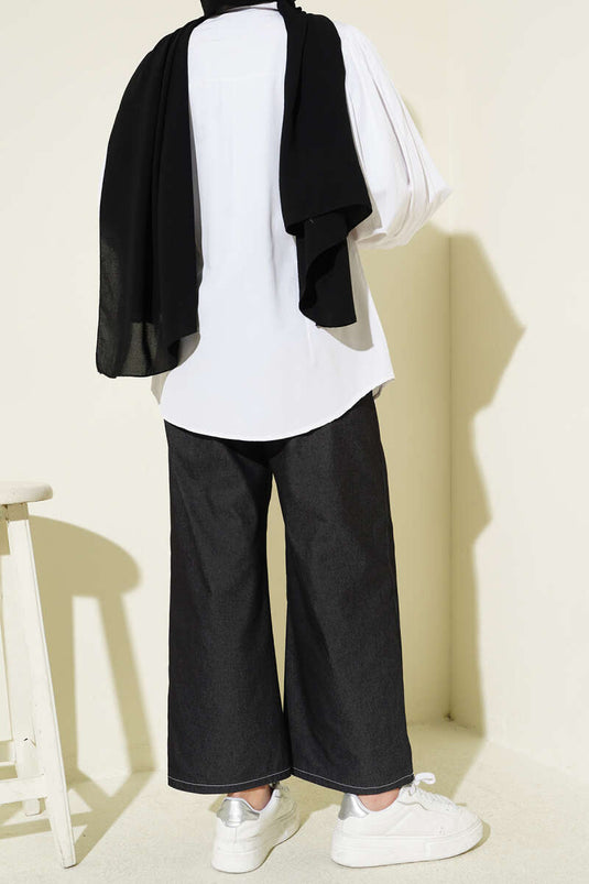 Pantaloni neri con fascia elastica e cintura elegante