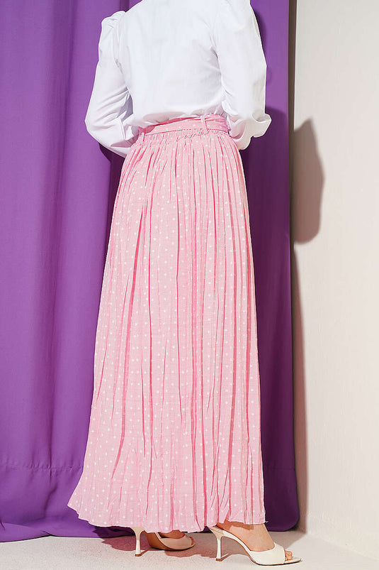 Jupe plissée à pois avec ceinture rose